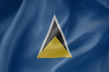 Saint Lucia Old waving flag close up fabric texture background