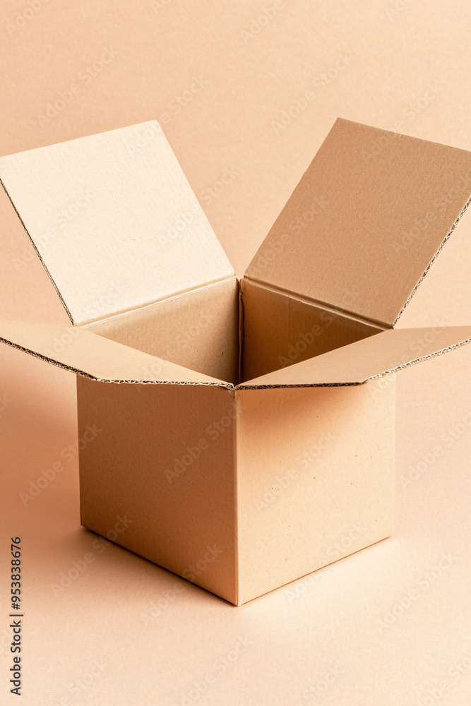 Poster An open cardboard box on soft background, ready for packing or storage. Its simple design symbolizes organization and potential.