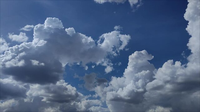 Gray dark cumulonimbus moving in a lighter sky