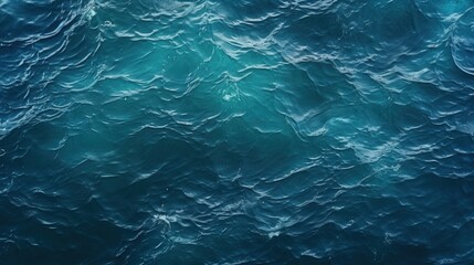 Fototapeta premium A serene depiction of ocean water with gentle waves, showcasing a blend of deep blues and turquoise hues.