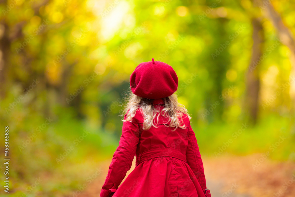 Wall mural little girl in autumn park