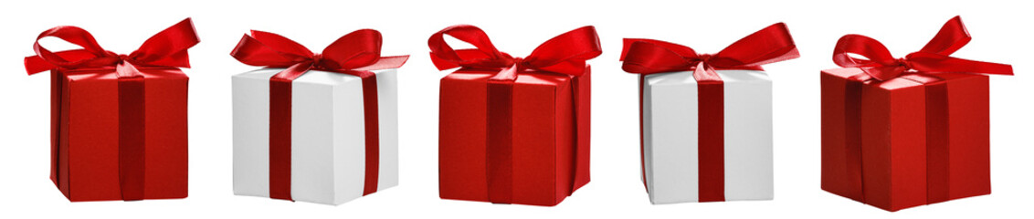 Set of Christmas gifts with red bows isolated