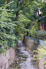 
stone walls along the edge of the canal