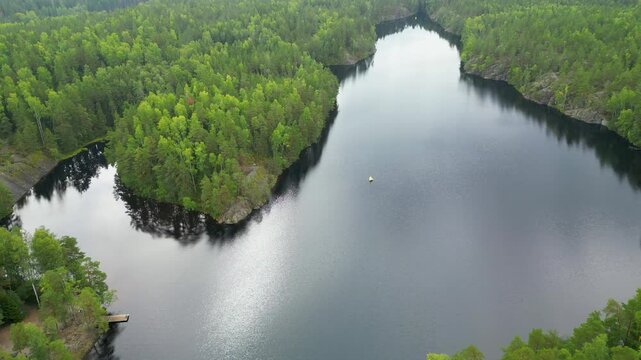 Kaitalampi Lake in Espoo, Finland. Kaitalampi Lake is located in Espoo, a city in southern Finland, part of the Greater Helsinki area. 