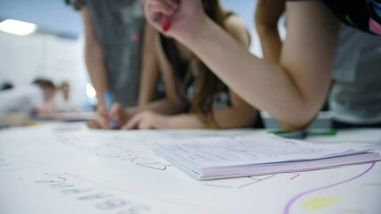 Students collaborating on creative project