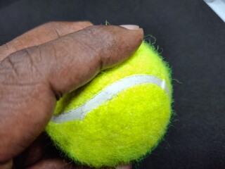 A tennis ball is a pressurized, rubber sphere covered in bright, felt fabric. It’s designed for...