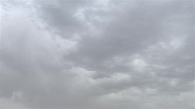 Stormy grey sky footage with some light