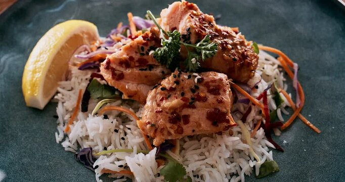 Cuisine, food and seasoning with meal plating in restaurant from above health, nutrition or wellness. Chicken, rice and vegetable dish for gourmet flavour, hospitality or service with fresh spice