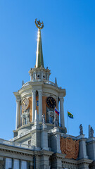Upper part of administration building of city of Yekaterinburg, Russia. Public authority that heads system of executive authorities of city of Yekaterinburg. Vertical image