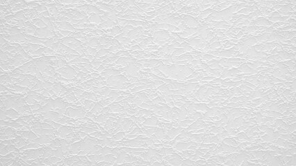 A grey wall abctract texture background with a few scratches and marks. The wall is very plain and has no decoration