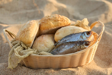 Christianity, religion, Bible concept. Five loaves of bread and two fish