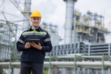 Petroleum engineer working at oil refinery site