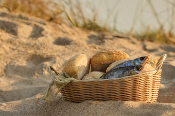 Christianity, religion, Bible concept. Five loaves of bread and two fish