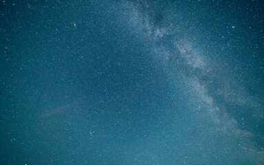 Beautiful bright milky way galaxy at the starry night sky. Astronomical background.