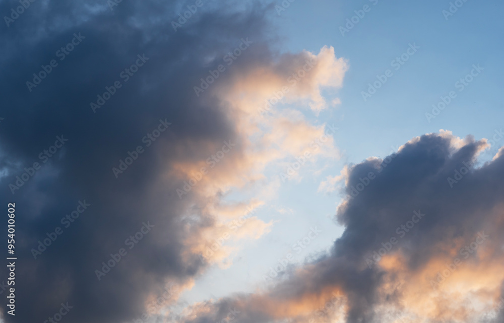 Wall mural beautiful tender sunrise sky with clouds. sky background.