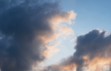 Beautiful tender sunrise sky with clouds. Sky background. 