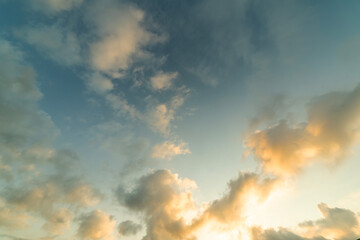 Beautiful tender sunrise sky with clouds. Sky background. 