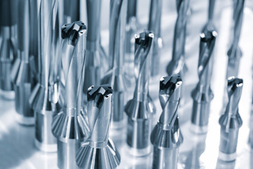 industrial drilling milling metal cutting tool with carbide cutter insert in workshop. Drills with...