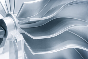 Part of a metal turbine printed on a 3D printer, new additive technologies concept background