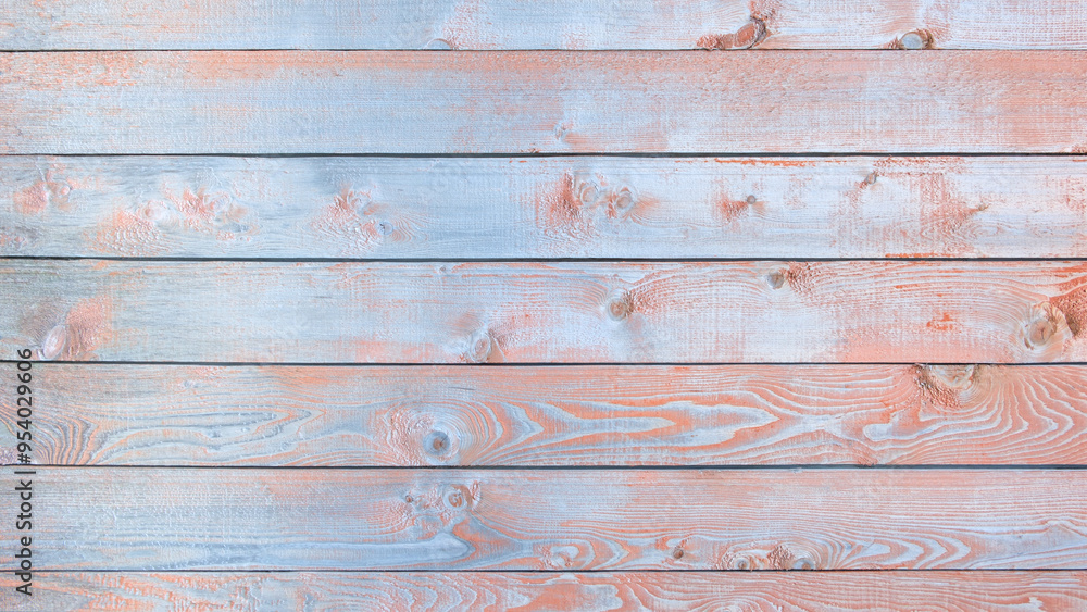 Poster a wooden board with a blue and orange color scheme. the board is made of wood and has a rustic appea