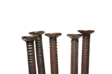 A photograph of a rusty iron nail against isolate on white background