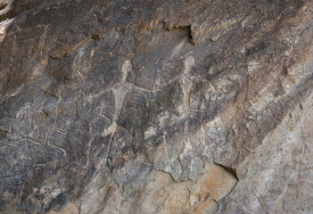 Ancient rock carvings petroglyphs in Gobustan National park. Gobustan petroglyphs are listed by UNESCO as World Heritage. Gobustan near Baku, Azerbaijan.