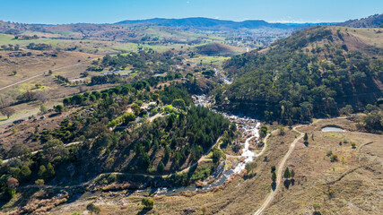 Drone aerial photograph of the Adelong Falls Gold Mine ruins near the town of Adelong in the Snowy Mountains in New South Wales in Australia.