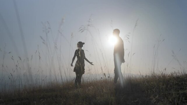 Young couple arguing and fighting outdoors