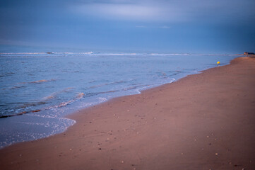 Seacost in Belgium. North sea on the sunset