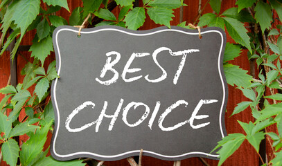 Best choice symbol. Blackboard with words Best choice. Beautiful red background with plants....