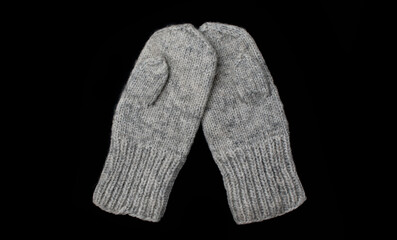 Winter mittens on a dark background