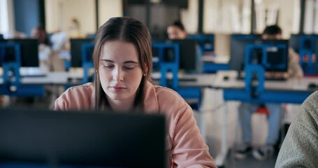 Computer, education and girl student in classroom for learning, lecture or lesson at university. College, scholarship and study with learner or pupil in school class for online assessment and report