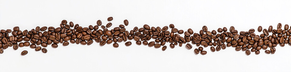 Naklejka premium Coffee beans on white background