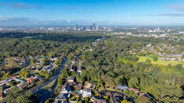 Drone aerial photograph of houses and the general landscape and precinct heading towards to the city of Parramatta in the greater Sydney region of New South Wales in Australia.