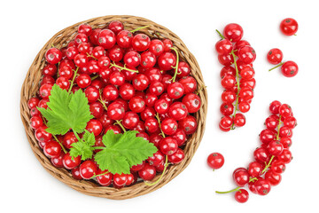 Red currant berries in a wicker basket with leaf isolated on white background. Top view. Flat lay