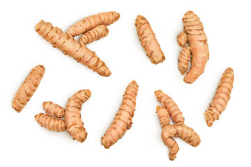 Turmeric root isolated on white background. Top view. Flat lay