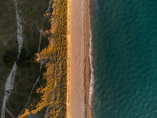 Aerial photo taken with a drone in Normandy beach sunset dunes 