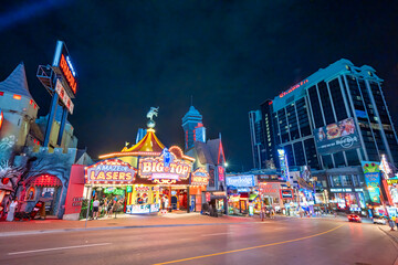 Niagara Falls, Canada - August 5, 2024: Downtown Niagara Falls streets and buildings at night in summer season