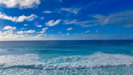Obraz premium Grand Anse Beach in La Digue, Seychelles. Aerial view of tropical coastline on a sunny day