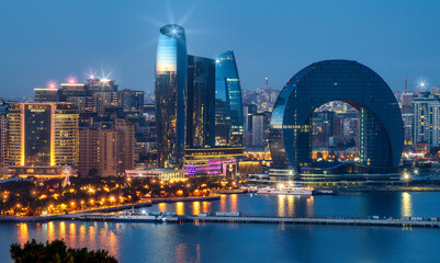 Baku, Azerbaijan. View of the Crescent Bay business center and Port of Baku from the upland park....