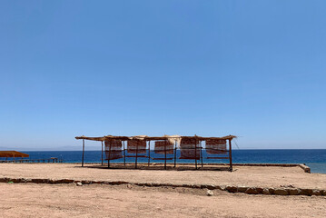 beach chairs on the beach, Dahab, Egypt