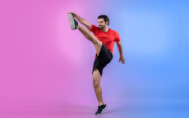 Full body length gaiety shot athletic and sporty young man with fitness in cardio exercise, kicking position posture on isolated background. Healthy active and body care lifestyle.