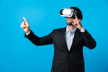 Smart business man holding something while touching VR goggle. Project manager planning marketing strategy while using visual reality headset to connect metaverse. Technology innovation. Deviation.