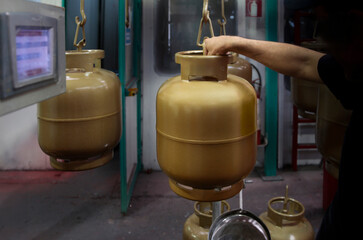 Bottled Gas. Gas cylinder production process. Process of quality control, gas cylinder painting, ...