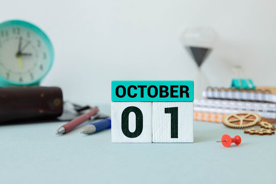 Vintage photo, October 1st. Date of 1 October on wooden cube calendar