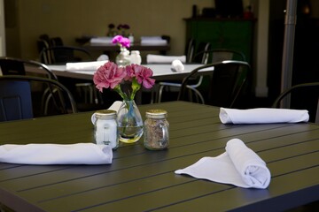 sidewalk cafe with outdoor tables and chairs