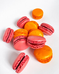 Sweet colorful macaroons isolated on a white background. Delicious colorful macarons. Sweets isolated on a white background. Photos of cookies for banners and websites.
