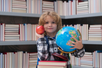 Back to school. Funny little boy from elementary school with book. Education.