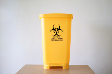 Medical waste bin. Biohazard contaminated waste sign trash garbage bin.