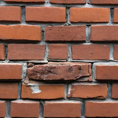 Obraz premium Close up of red brick wall with mortar